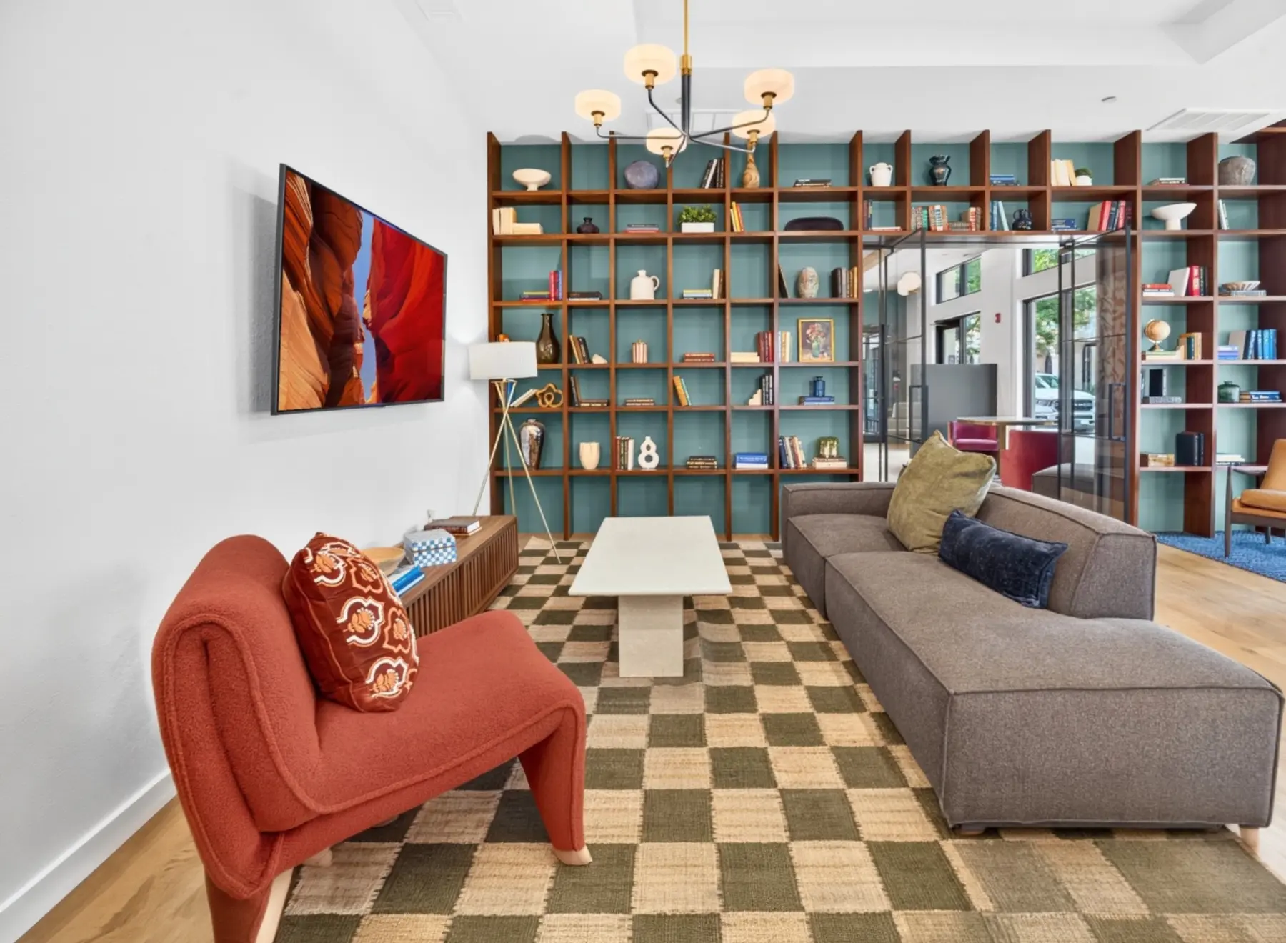 Multifamily resident lounge with custom millwork and coordinated finish installation
