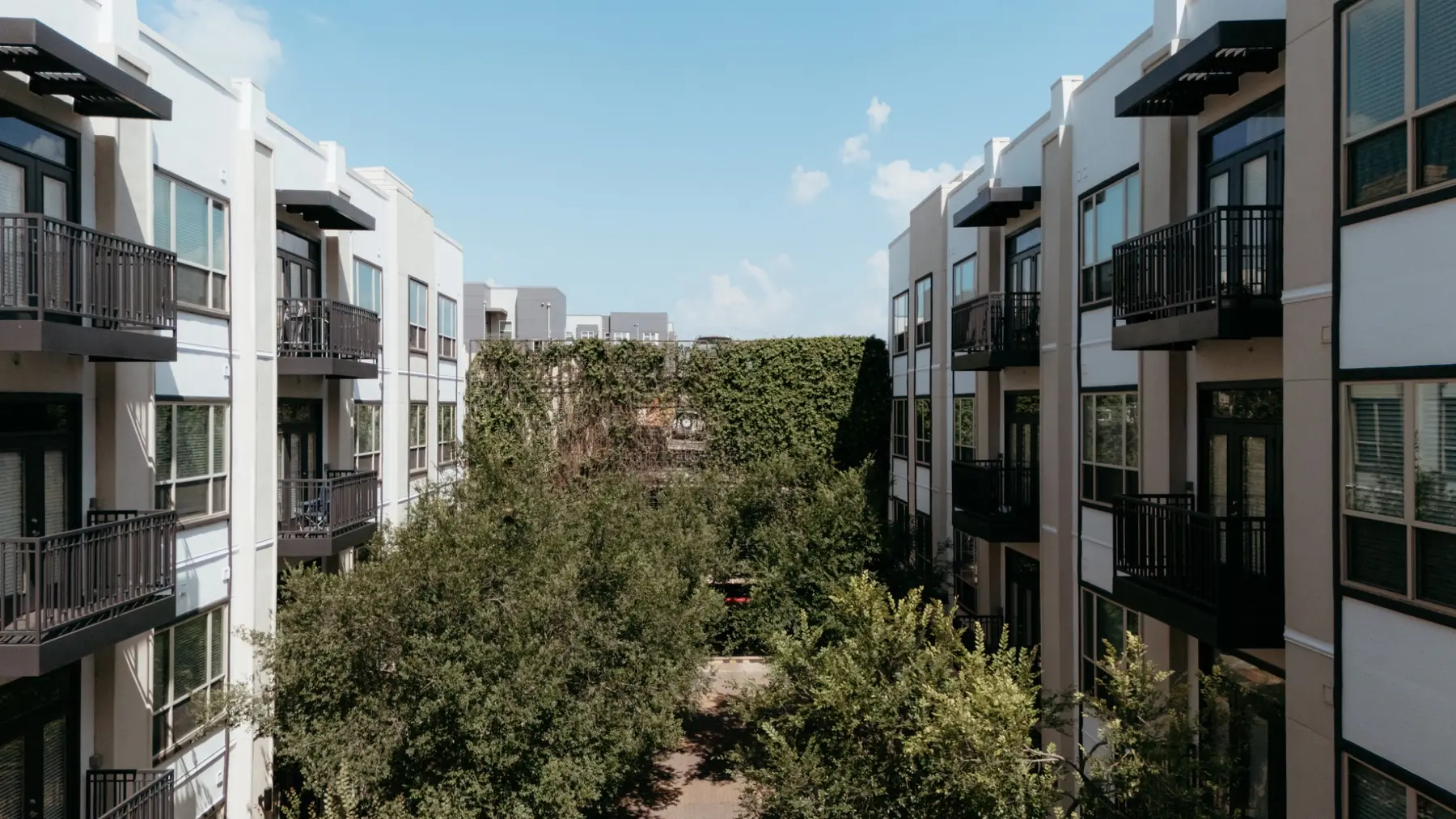 Refreshed multifamily courtyard facades and balconies
